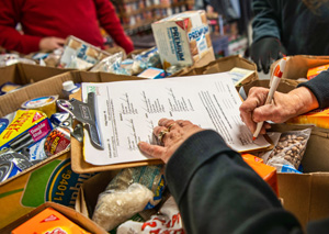 Helping prepare food aid